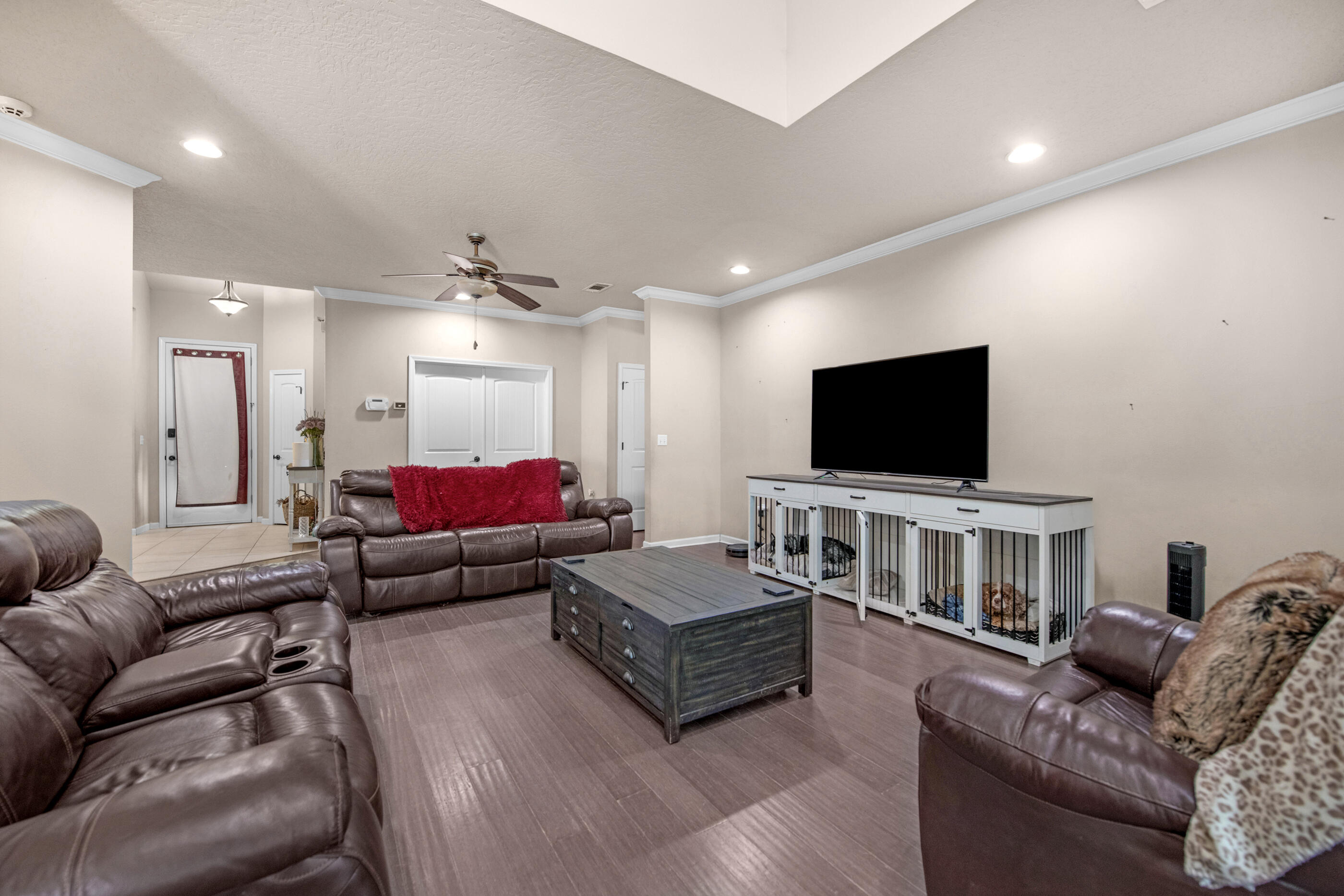 4537 Annabelle Lane Crestview, FL 32539 - Photo 8 of 41 a living room with furniture and a flat screen tv