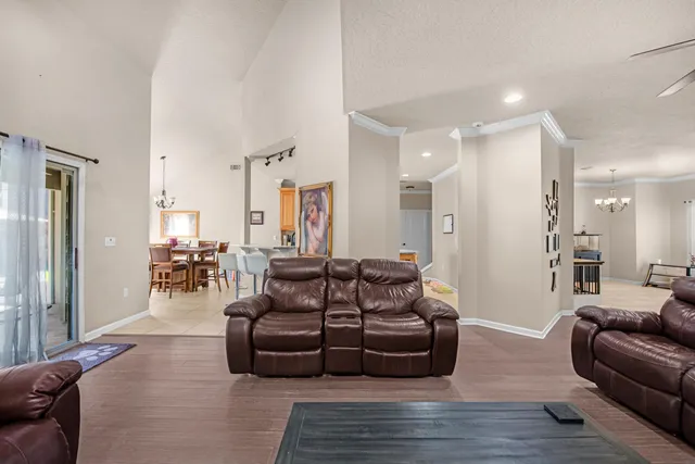 a kitchen with stainless steel appliances granite countertop a sink stove and microwave