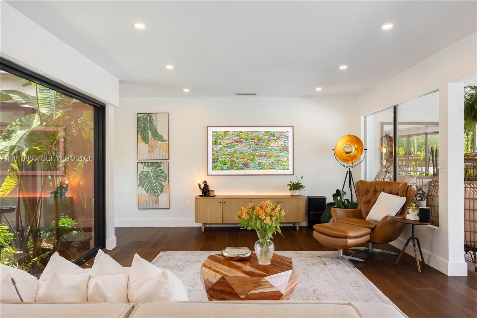 9670 Southwest 96th Court Miami, FL 33176 - Photo 11 of 45 a living room with furniture and a large window