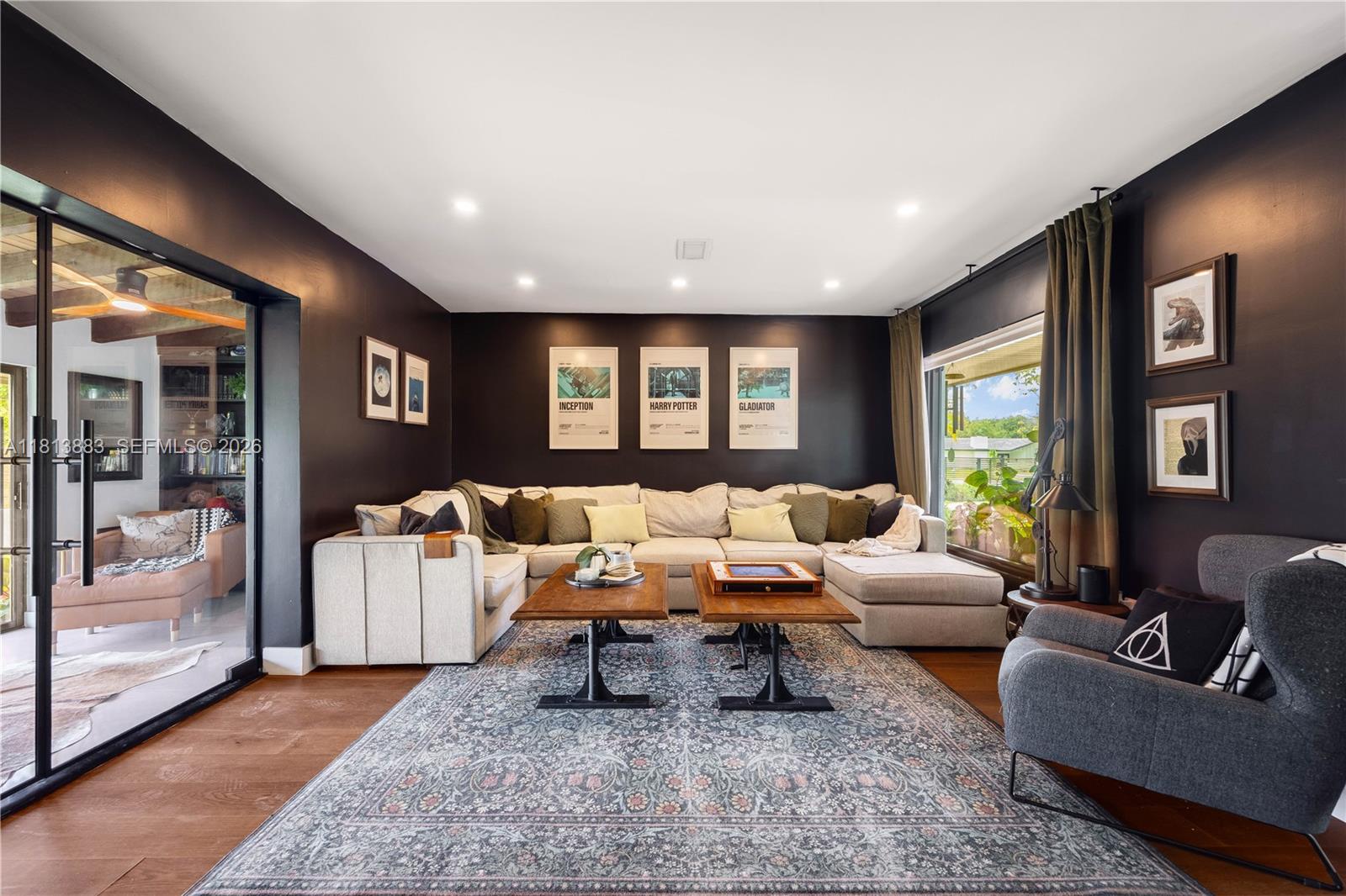 9670 Southwest 96th Court Miami, FL 33176 - Photo 17 of 45 a living room with furniture and a large window