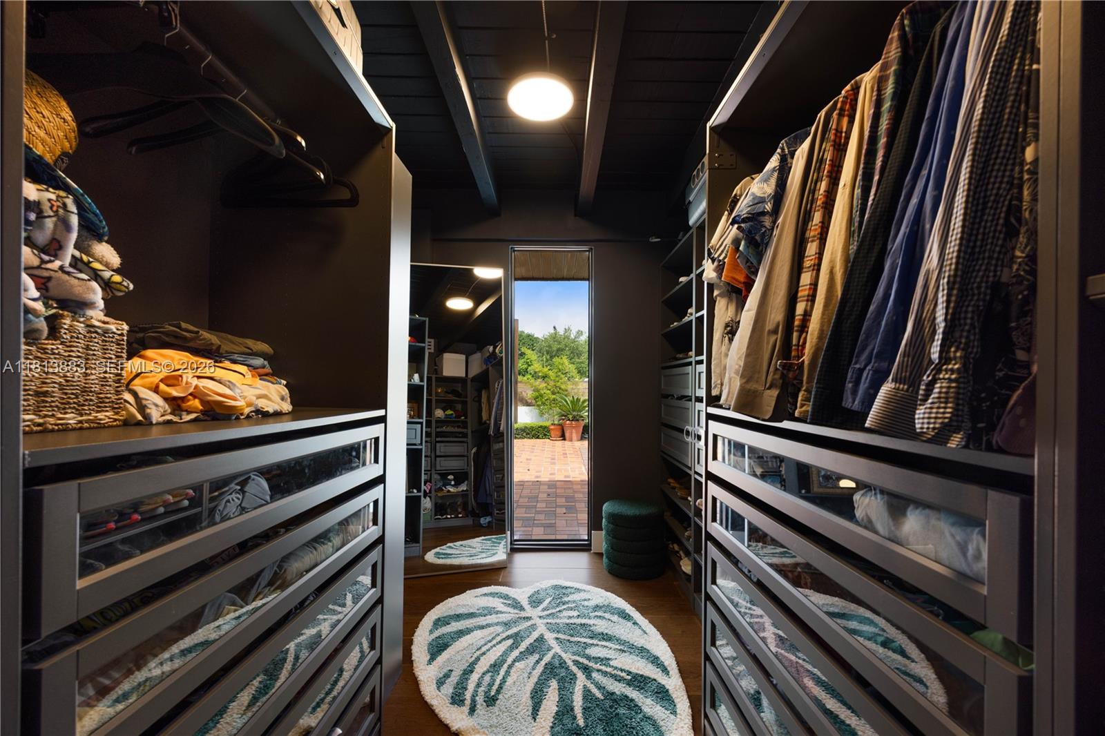 9670 Southwest 96th Court Miami, FL 33176 - Photo 22 of 45 a view of a living room with furniture and a flat screen tv