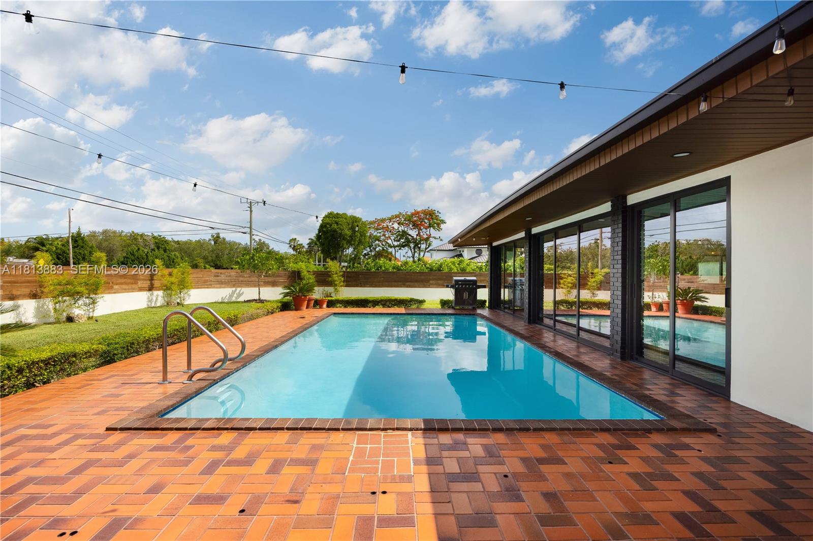 9670 Southwest 96th Court Miami, FL 33176 - Photo 34 of 45 a view of swimming pool