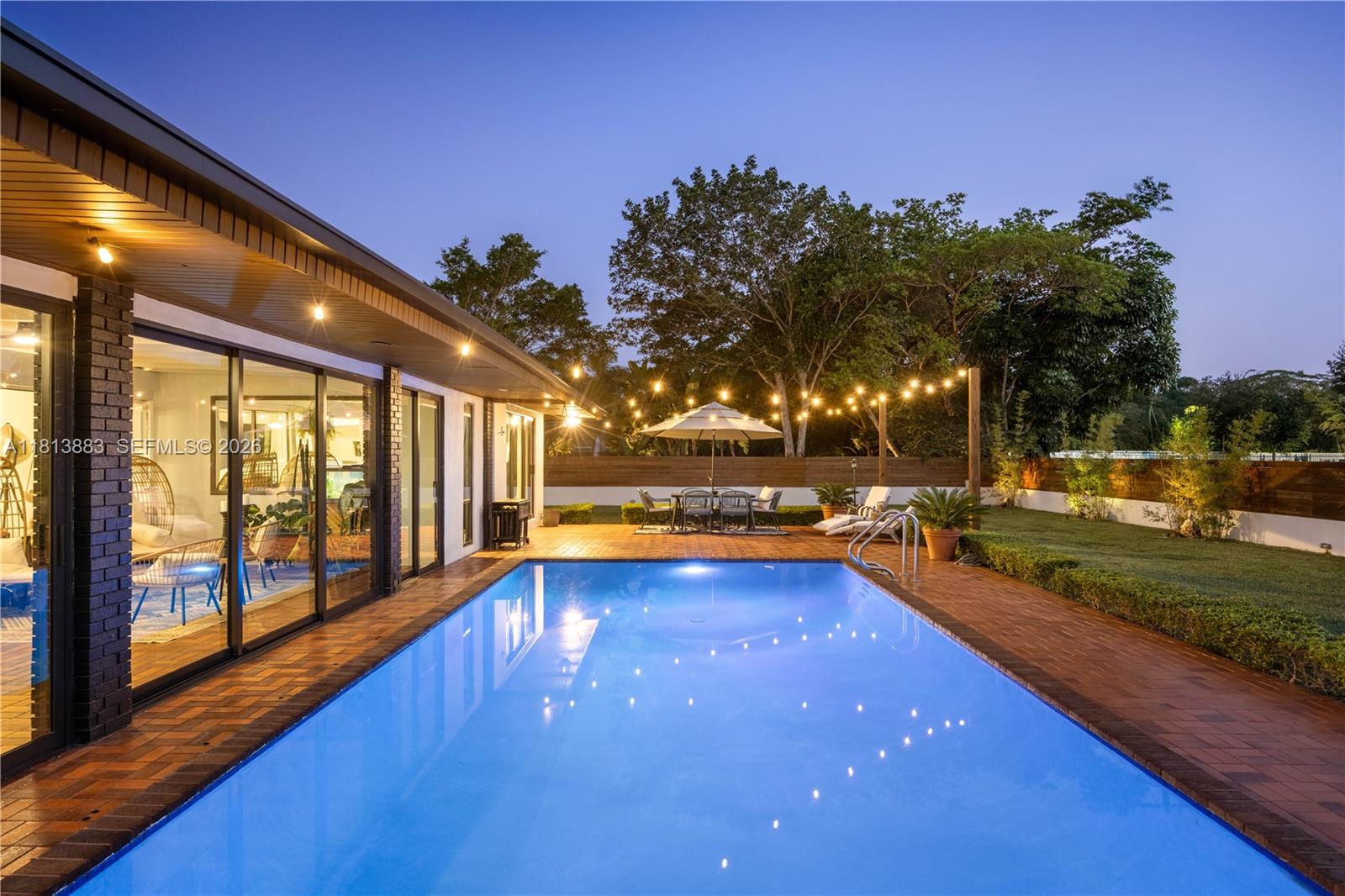 9670 Southwest 96th Court Miami, FL 33176 - Photo 37 of 45 a view of swimming pool with outdoor seating