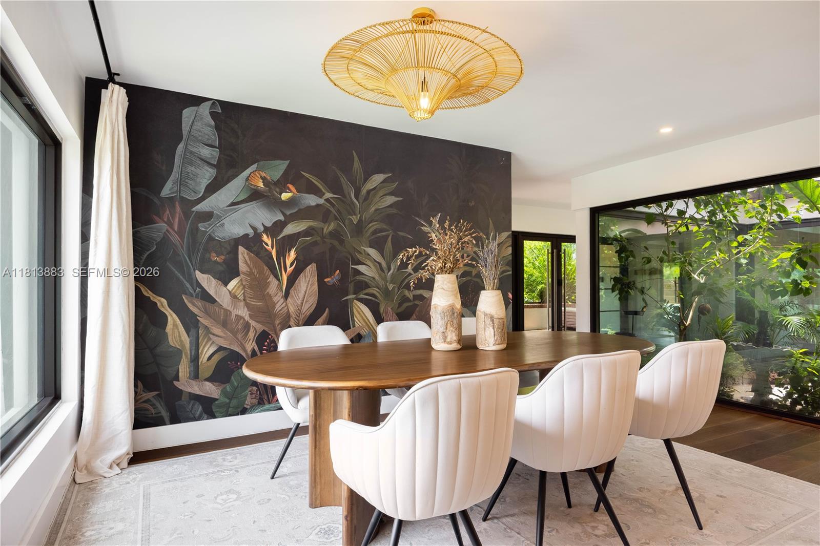 9670 Southwest 96th Court Miami, FL 33176 - Photo 8 of 45 a view of a dining room with furniture window and outside view