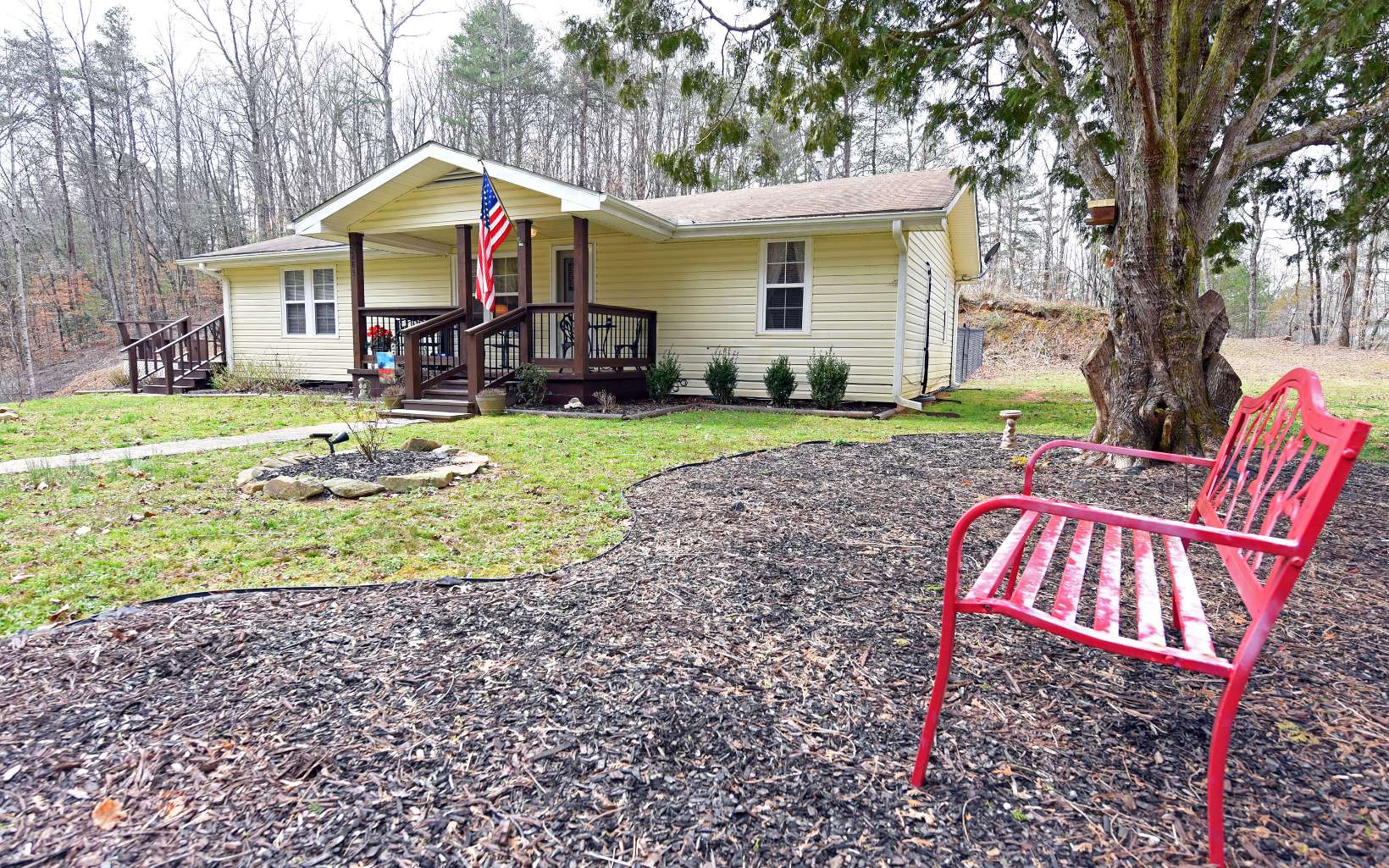 285 Oakgrove Road Murphy, NC 28906 - Photo 1 of 1 a front view of a house with garden