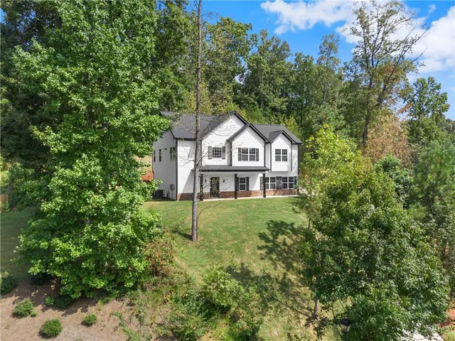 a house view with a garden space