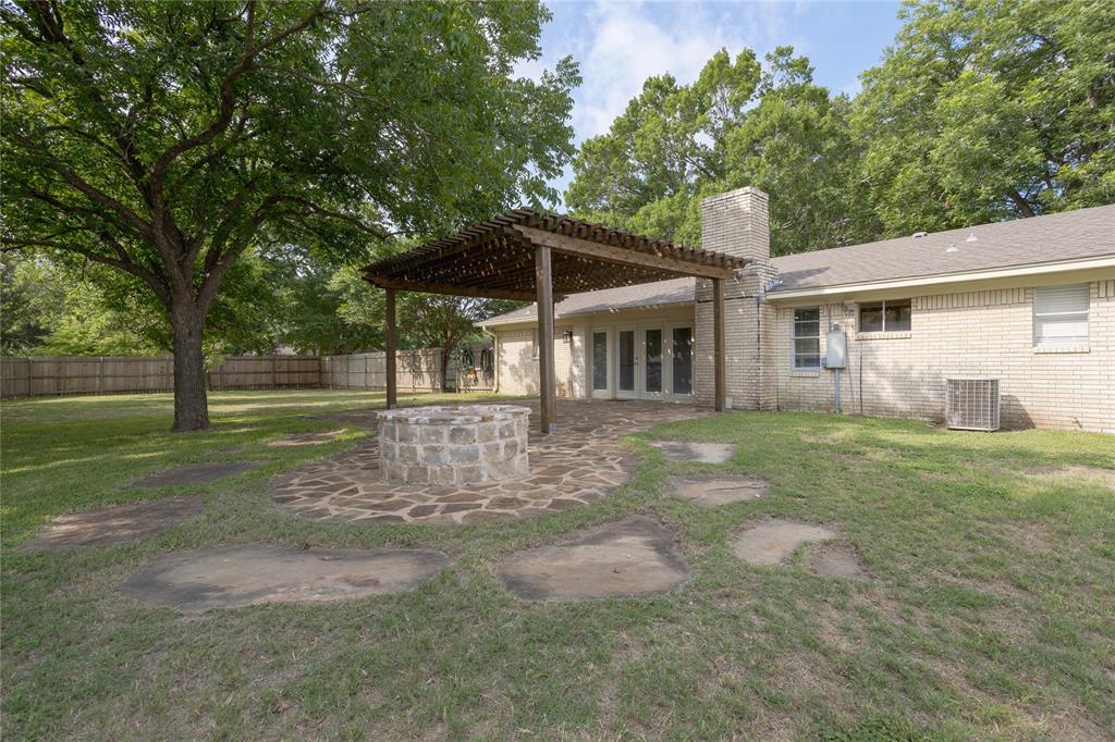 3999 Speegleville Road Waco, TX 76712 - Photo 31 of 34 Great outdoor living space, with a built in firepit.