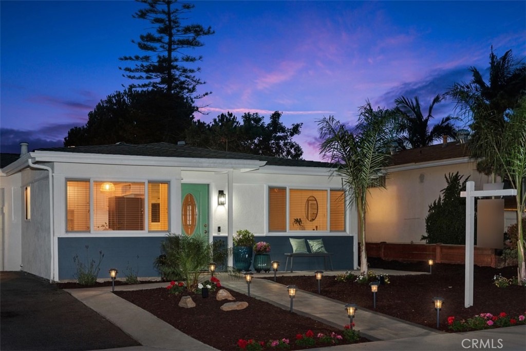 262 Coneflower Street Encinitas, CA 92024 - Photo 1 of 1 a front view of a house with a yard