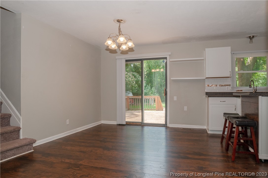 4605 Nix Road Fayetteville, NC 28314 - Photo 20 of 48 wooden floor in an empty room with a window