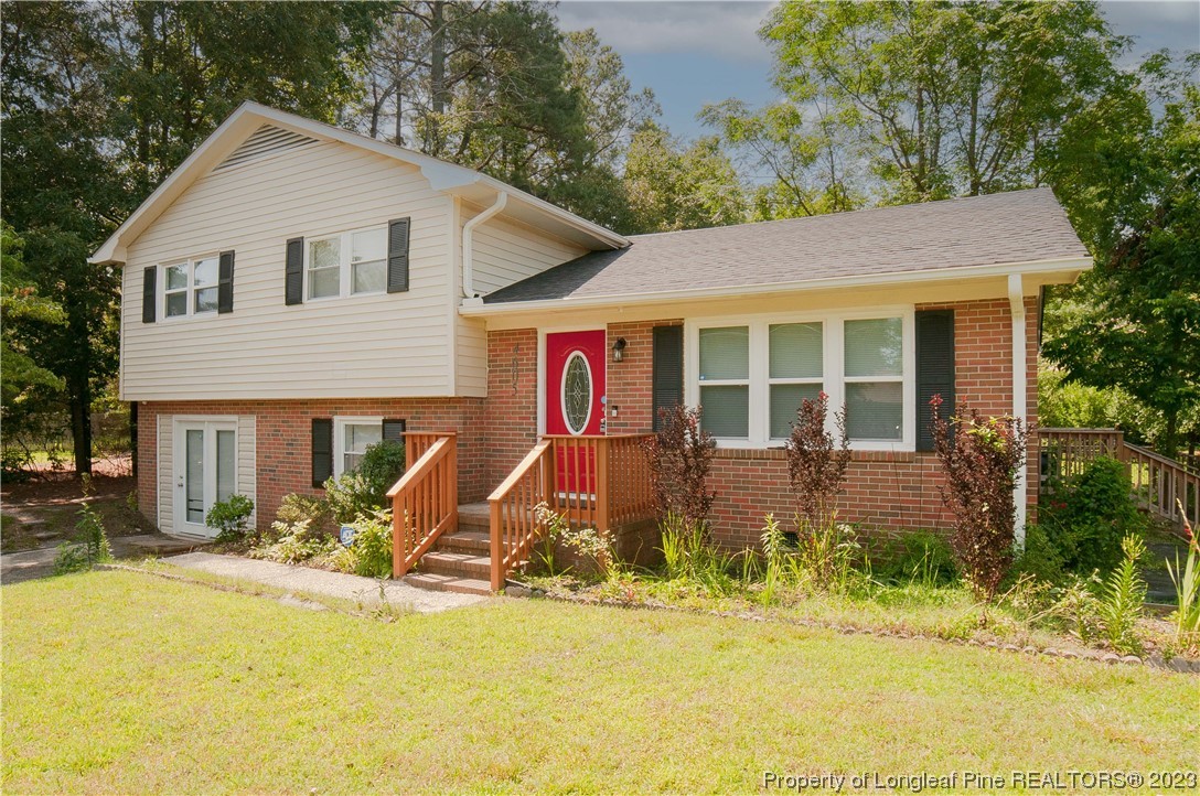 4605 Nix Road Fayetteville, NC 28314 - Photo 2 of 48 a view of a white house with a swimming pool and outdoor seating