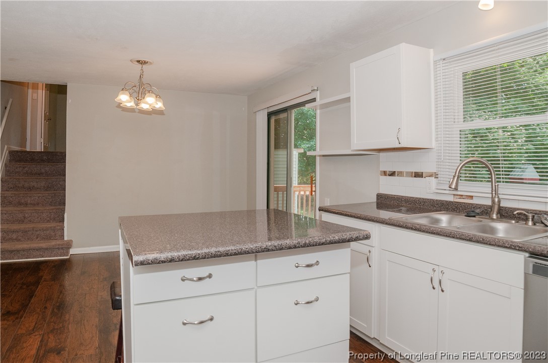 4605 Nix Road Fayetteville, NC 28314 - Photo 27 of 48 a kitchen with granite countertop stainless steel appliances sink and cabinets