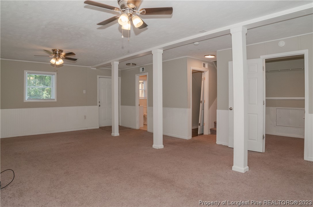 4605 Nix Road Fayetteville, NC 28314 - Photo 30 of 48 an empty room with windows and fan