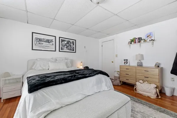 a bedroom with a bed and furniture