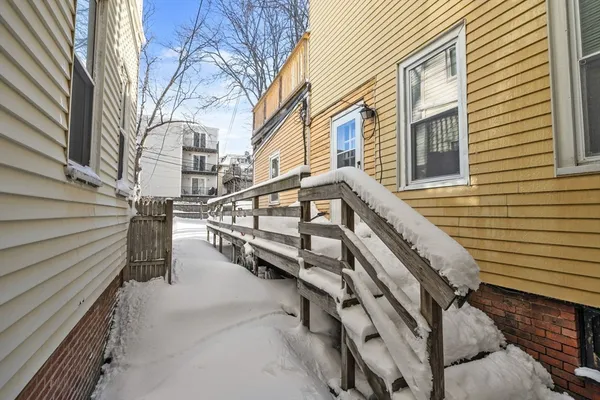 a view of a house with a street