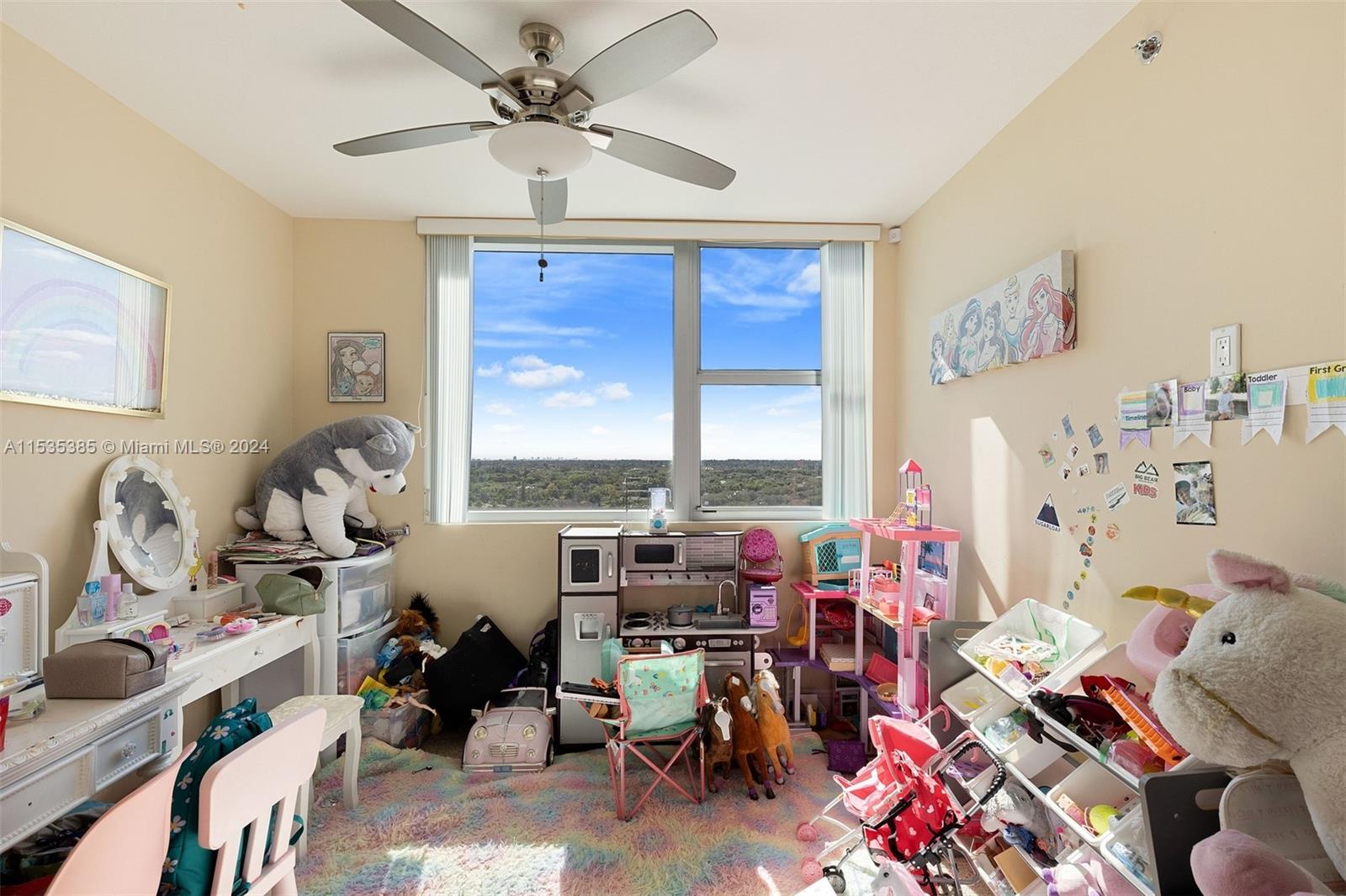 2681 North Flamingo Road, Unit 1405S Sunrise, FL 33323 - Photo 17 of 28 a room with furniture a rug and a window