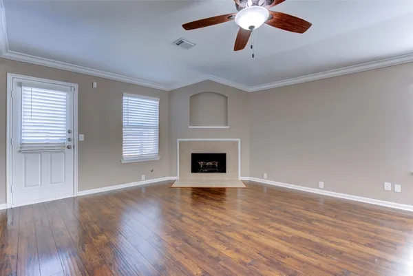 a kitchen with cabinets and stainless steel appliances
