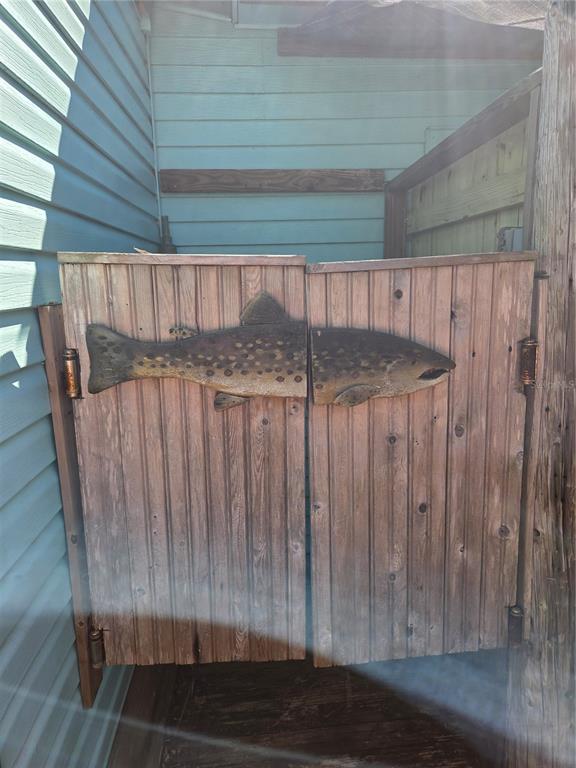 1024 Strickland Road Okeechobee, FL 34974 - Photo 20 of 23 a view of a door with wooden floor