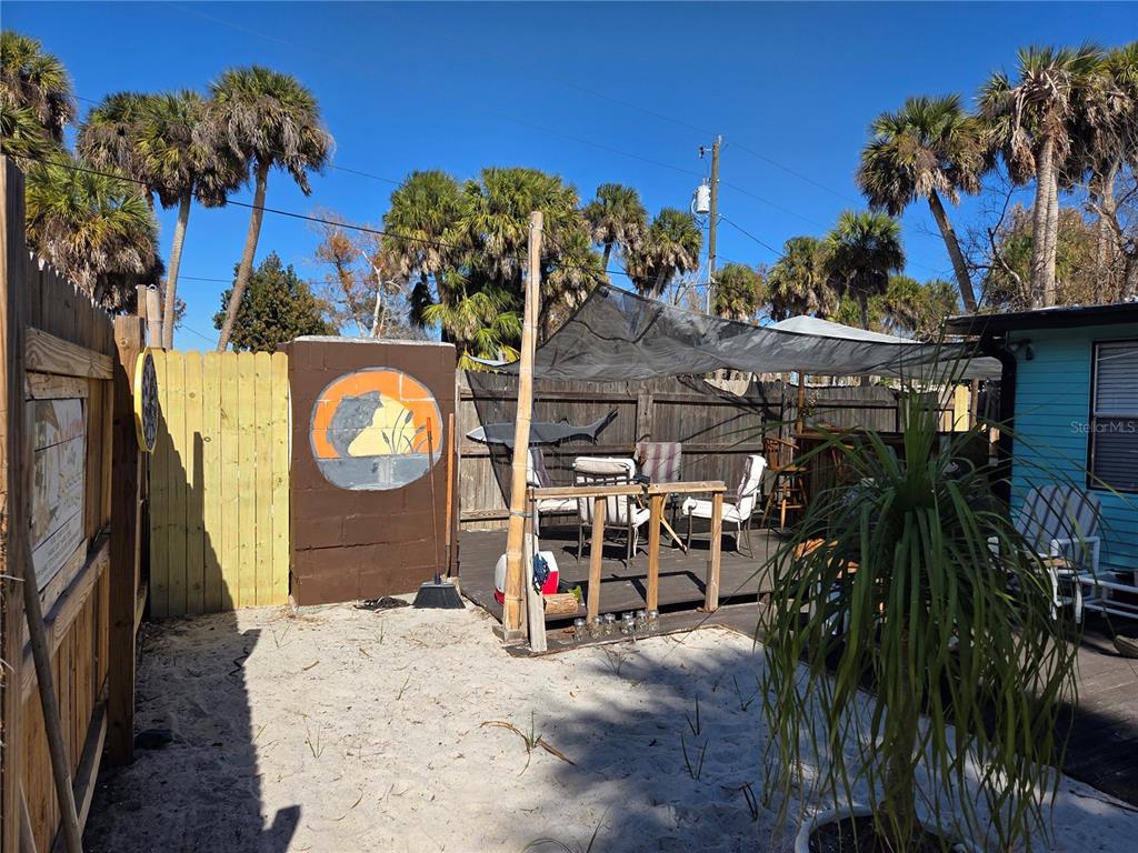 1024 Strickland Road Okeechobee, FL 34974 - Photo 4 of 23 an outdoor space with lots of palm trees