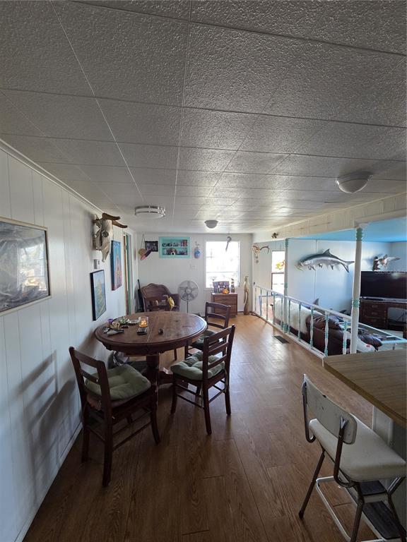 1024 Strickland Road Okeechobee, FL 34974 - Photo 8 of 23 a view of a dining room with furniture