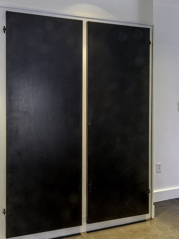15 Charter Street, Unit 4 Boston, MA 02113 - Photo 16 of 42 a bathroom with a glass shower door