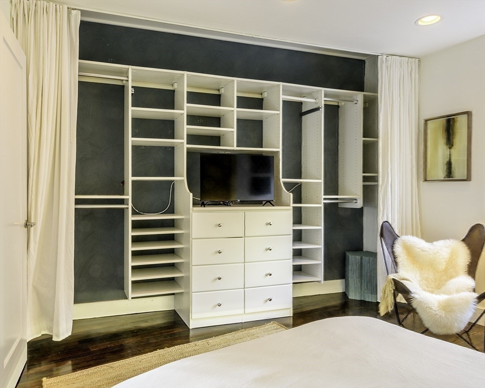 15 Charter Street, Unit 4 Boston, MA 02113 - Photo 29 of 42 a view of bedroom with furniture and flat screen tv