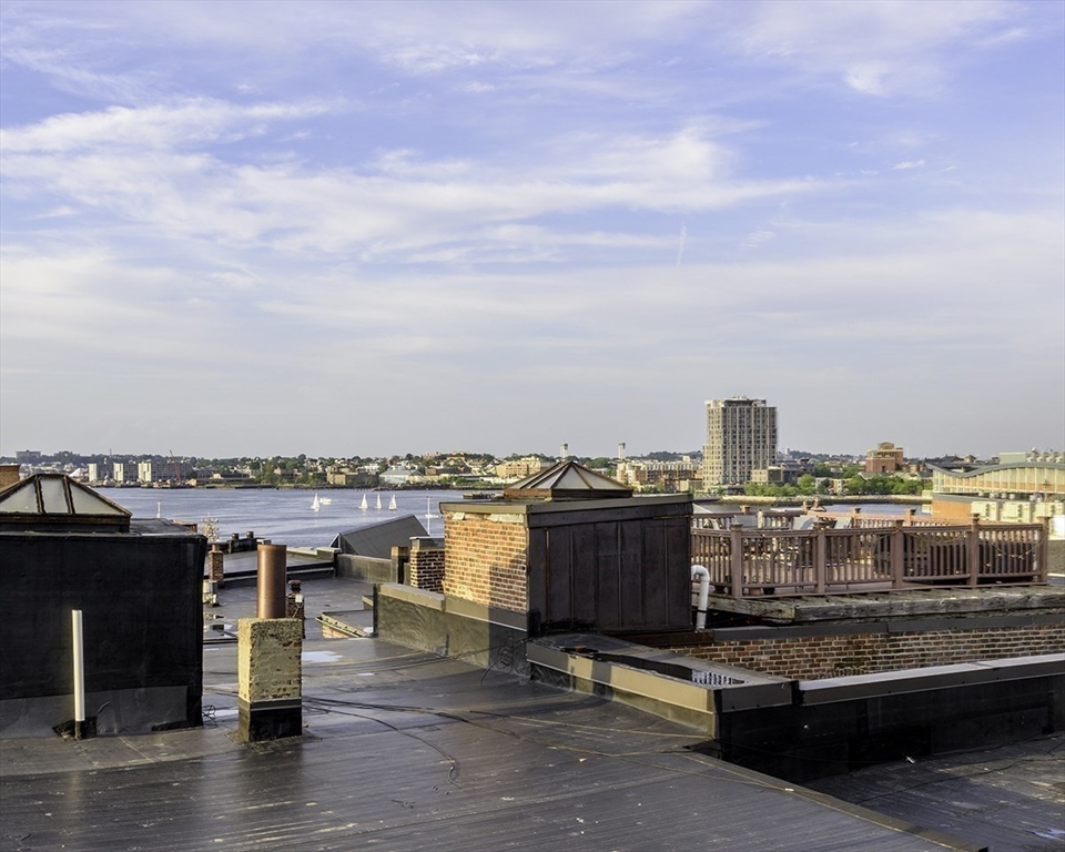 15 Charter Street, Unit 4 Boston, MA 02113 - Photo 36 of 42 a view of a terrace with seating area