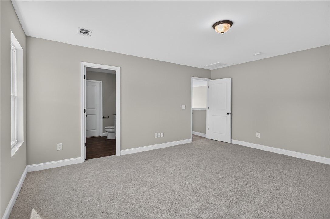 2007 Aberdeen Lane Walhalla, SC 29691 - Photo 17 of 41 A spacious room offers comfortable carpeting, ready for personalization and relaxation.