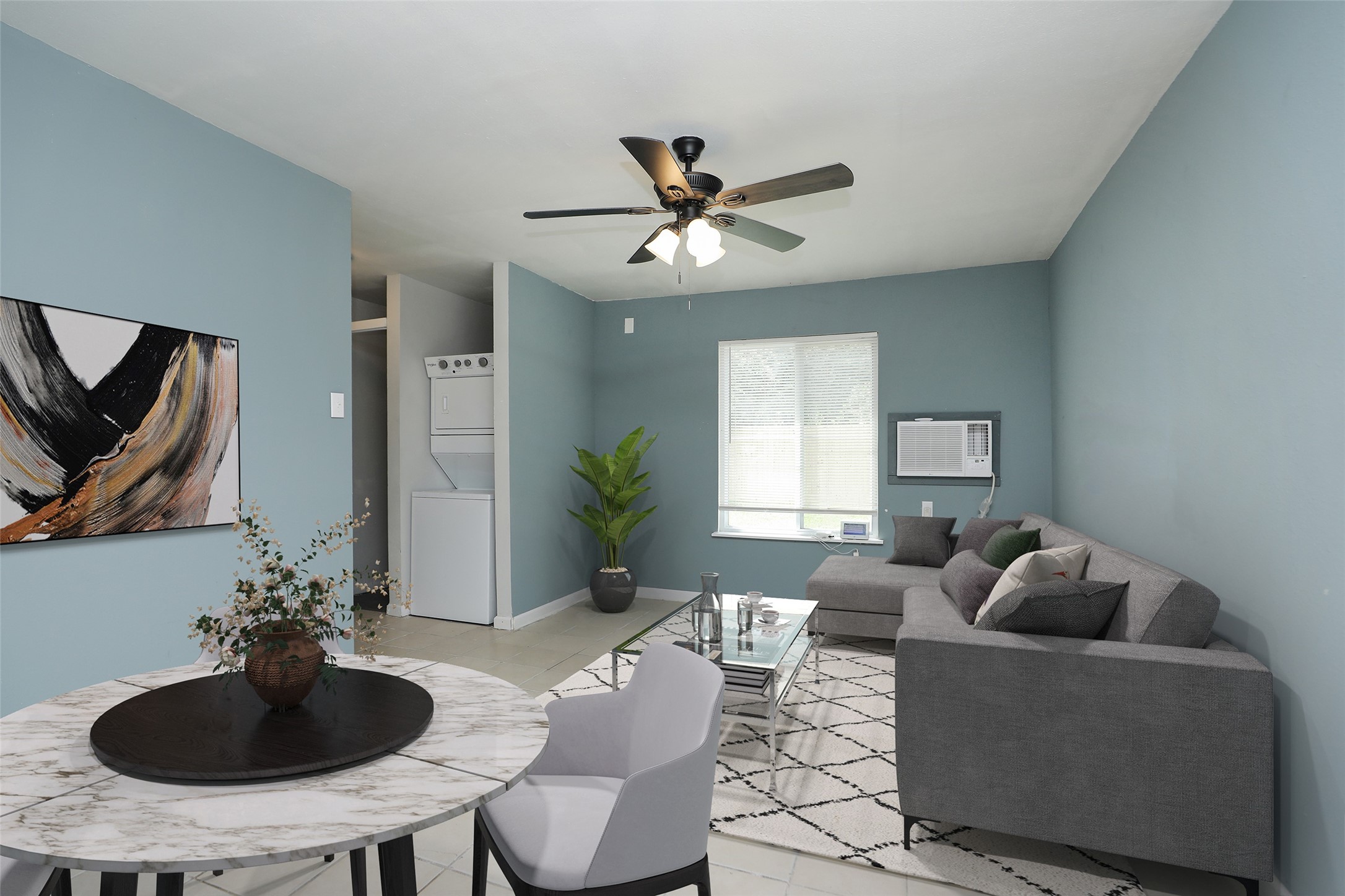 2814 Winbern Street Houston, TX 77004 - Photo 10 of 21 a living room with furniture a window and a chandelier