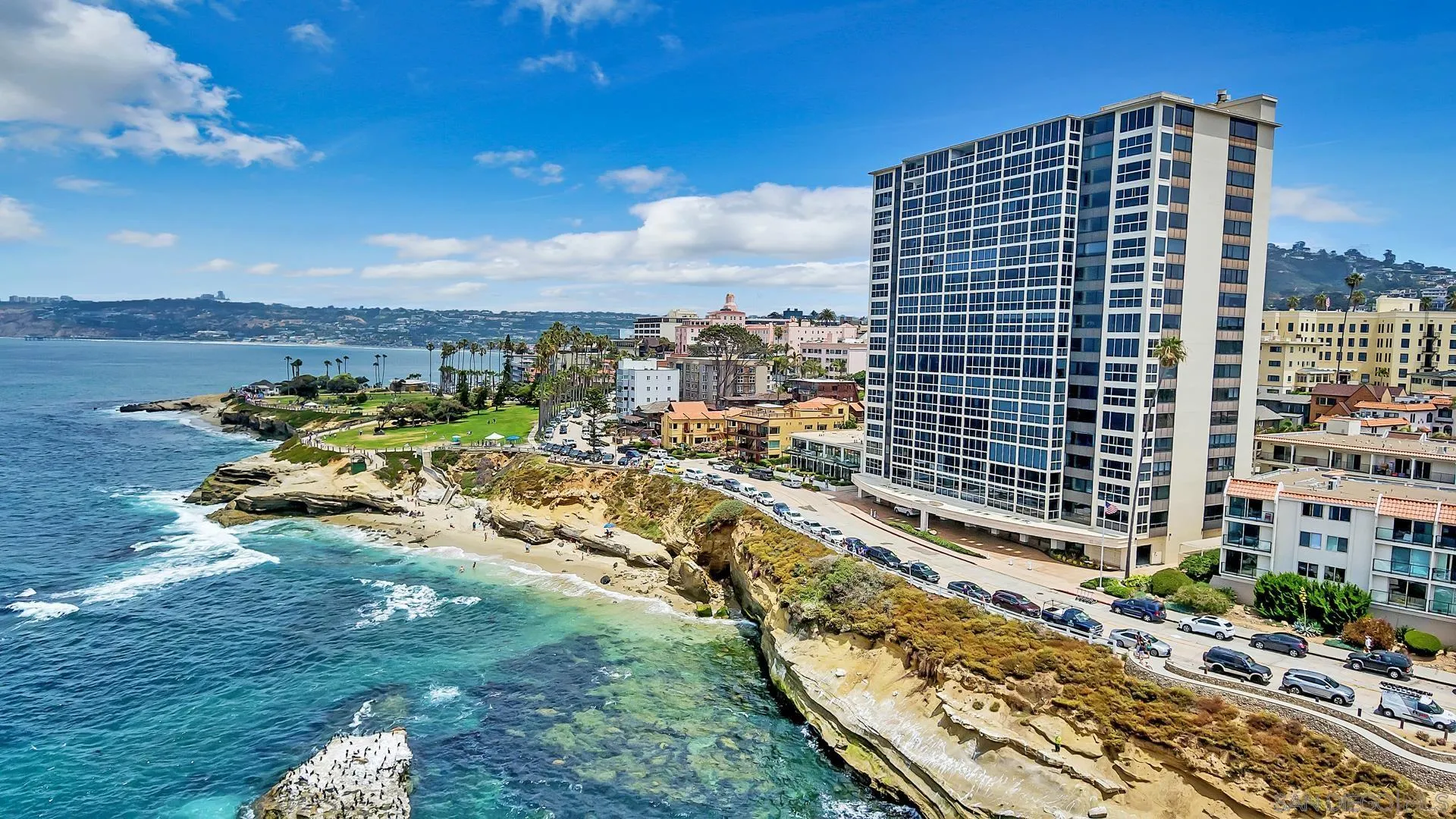 a view of a city with tall buildings