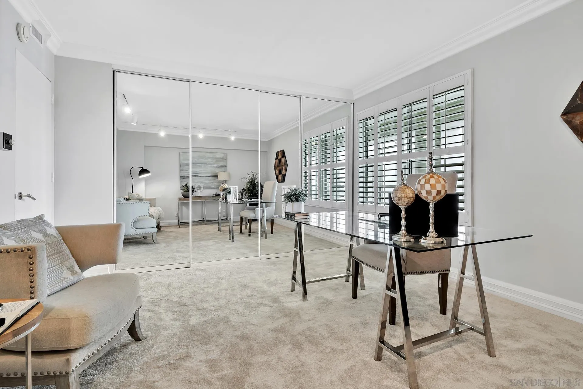 939 Coast Boulevard, Unit 12C La Jolla, CA 92037 - Photo 30 of 41 a view of a livingroom with furniture and a potted plant