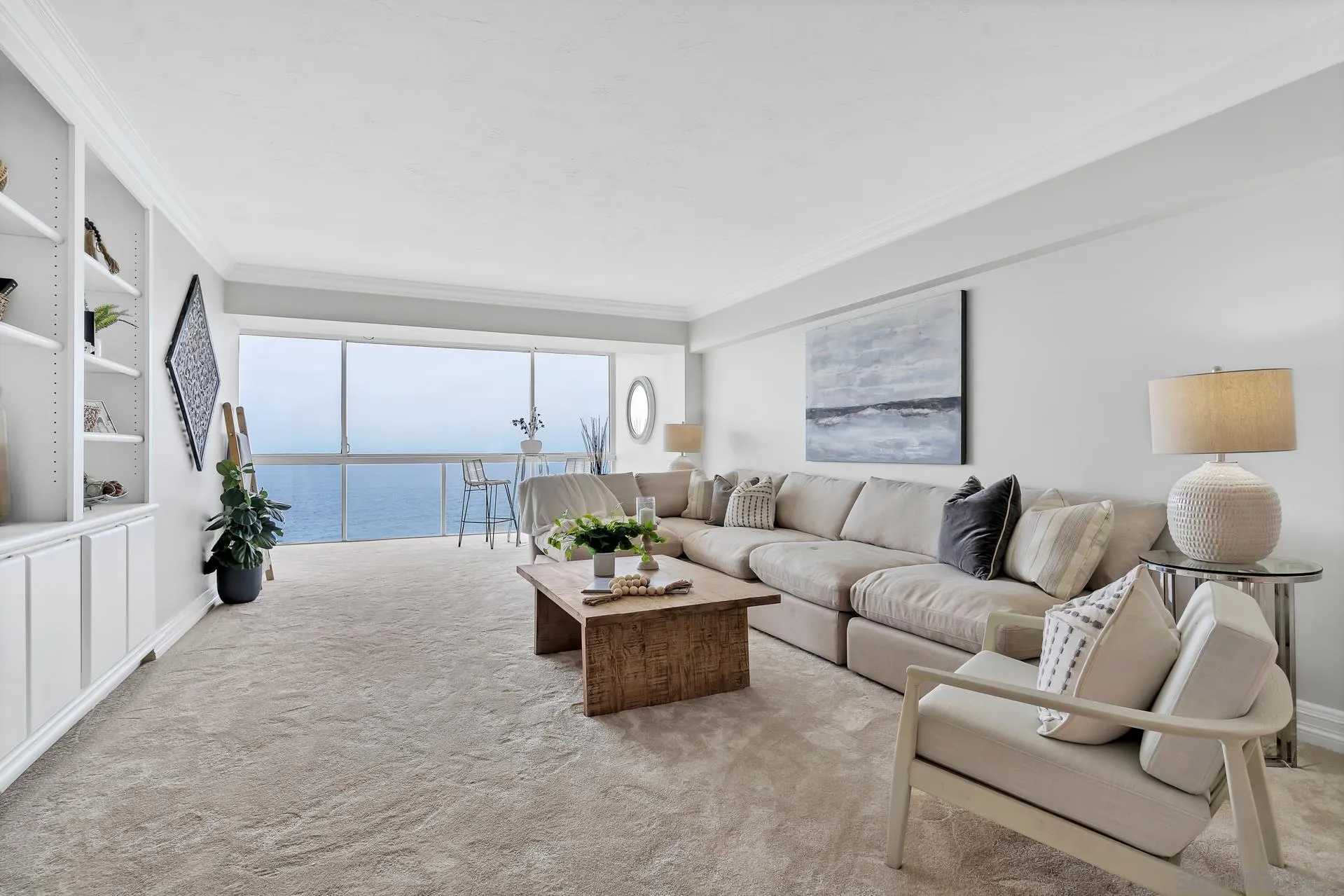 939 Coast Boulevard, Unit 12C La Jolla, CA 92037 - Photo 3 of 41 a living room with furniture and a large window