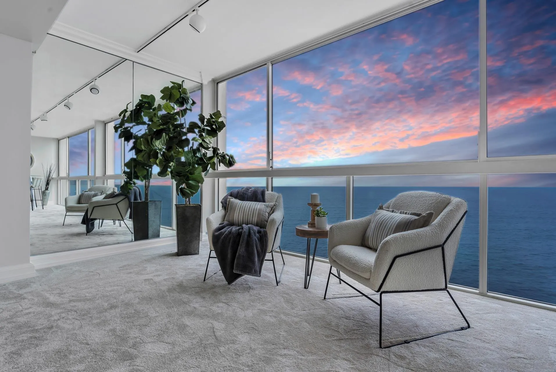939 Coast Boulevard, Unit 12C La Jolla, CA 92037 - Photo 31 of 41 a living room with furniture and a potted plant