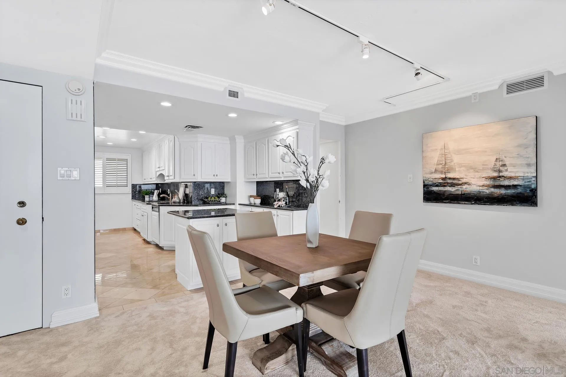 939 Coast Boulevard, Unit 12C La Jolla, CA 92037 - Photo 8 of 41 a view of a dining room with furniture