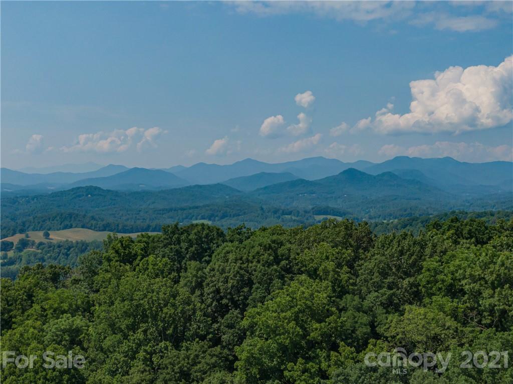 389 Winding Ridge Road, Unit 12 13 15 Marshall, NC 28753 - Photo 17 of 32 a view of mountain and sunset