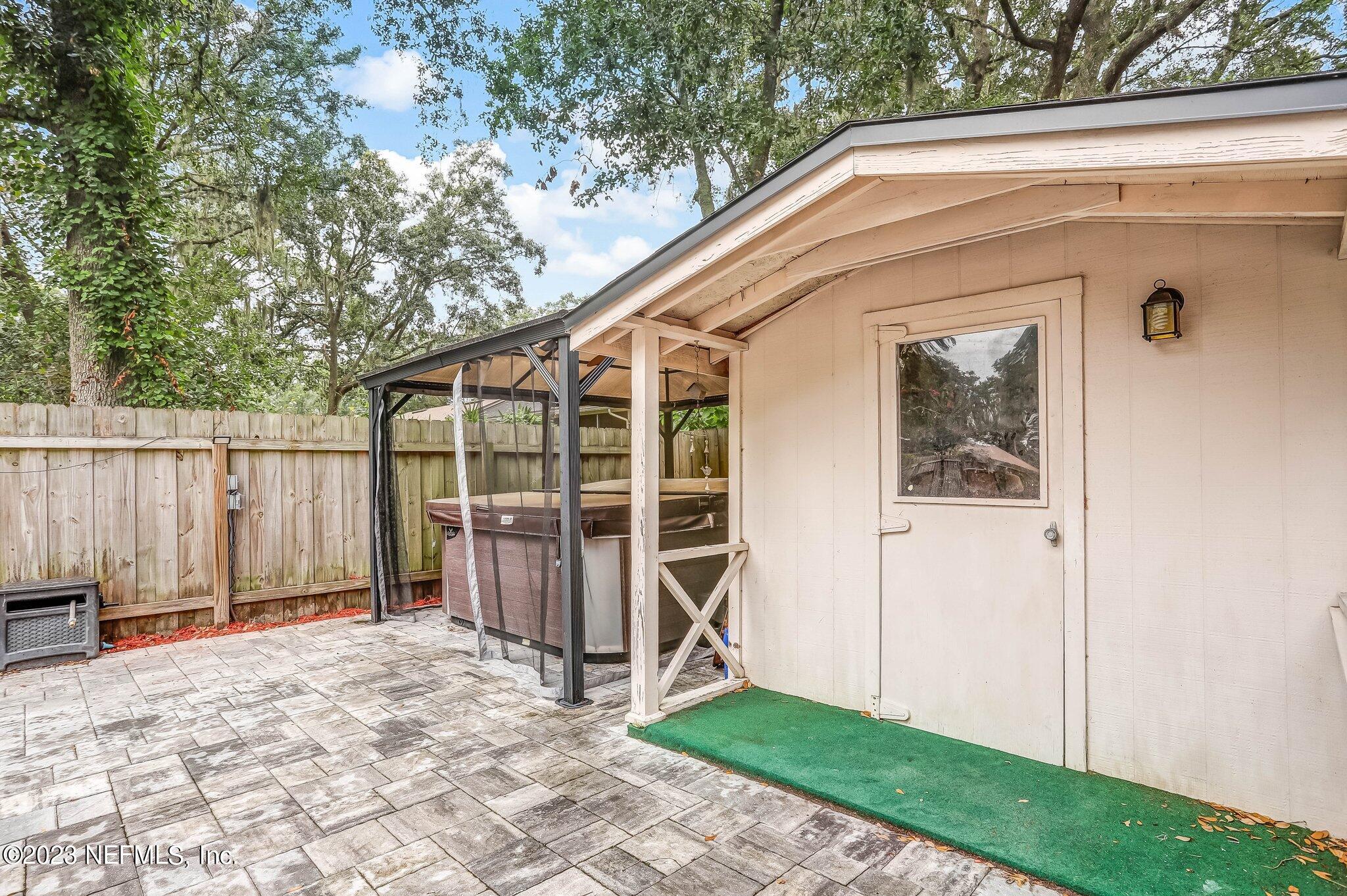 613 Hummingbird Court St. Johns, FL 32259 - Photo 26 of 29 a view of a small house with backyard