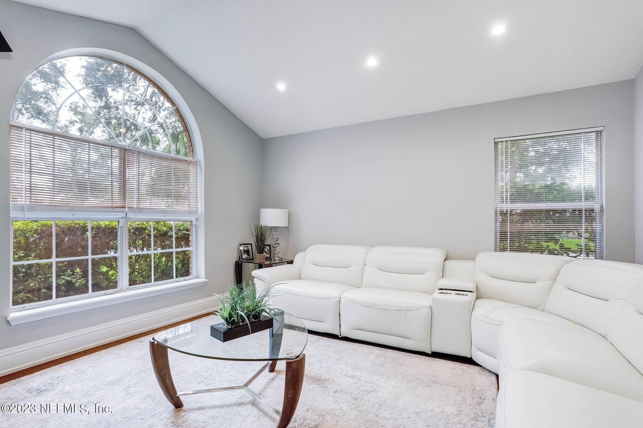613 Hummingbird Court St. Johns, FL 32259 - Photo 5 of 29 a living room with furniture and a large window