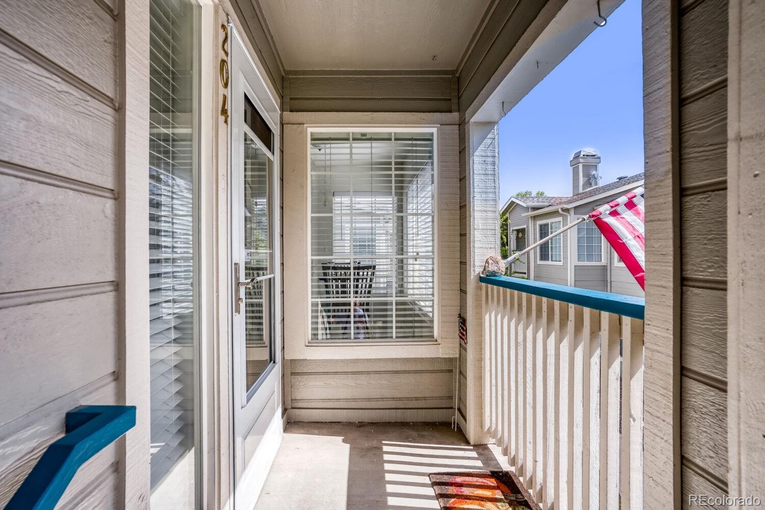 8437 South Thunder Ridge Way, Unit 204 Highlands Ranch, CO 80126 - Photo 22 of 27 a view of balcony and patio