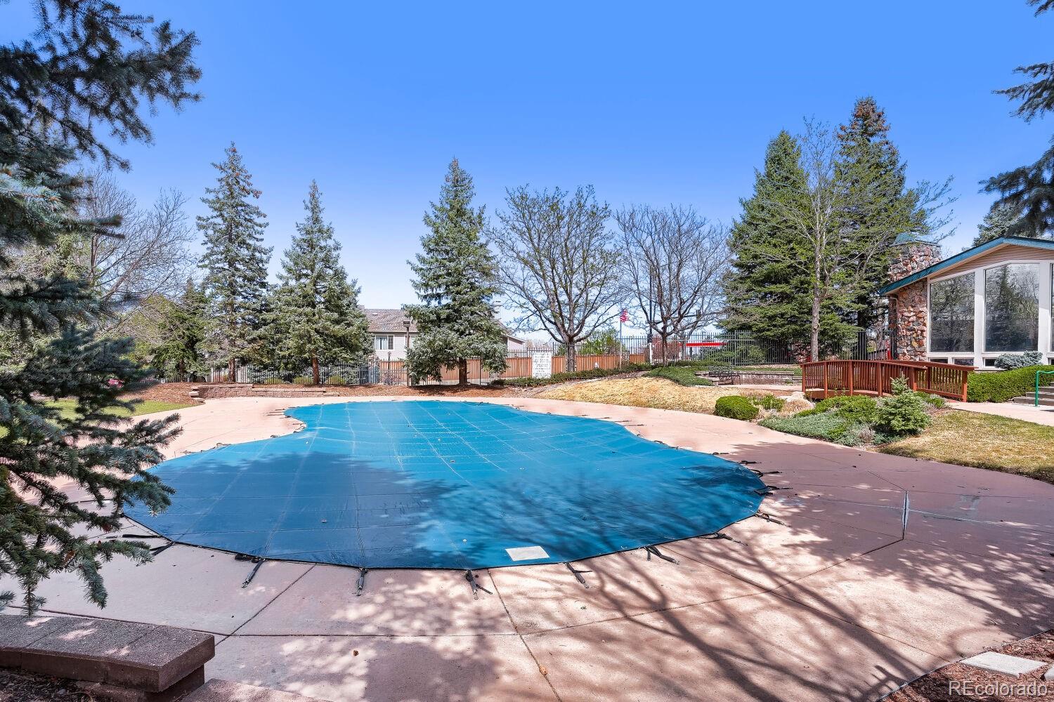 8437 South Thunder Ridge Way, Unit 204 Highlands Ranch, CO 80126 - Photo 25 of 27 a view of outdoor space yard and tree