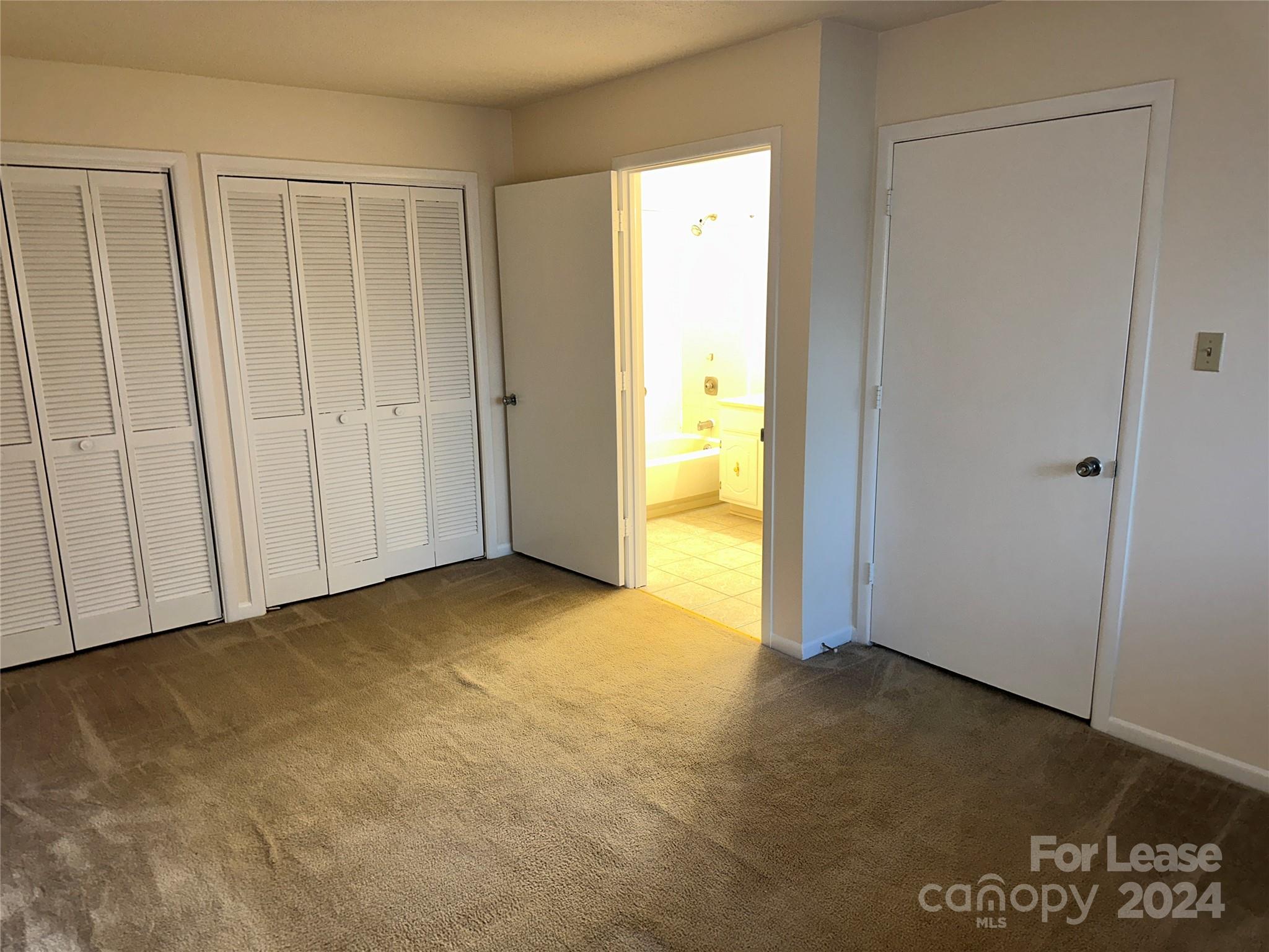 6121 Heathstone Lane, Unit B Charlotte, NC 28210 - Photo 4 of 9 a view of an empty room