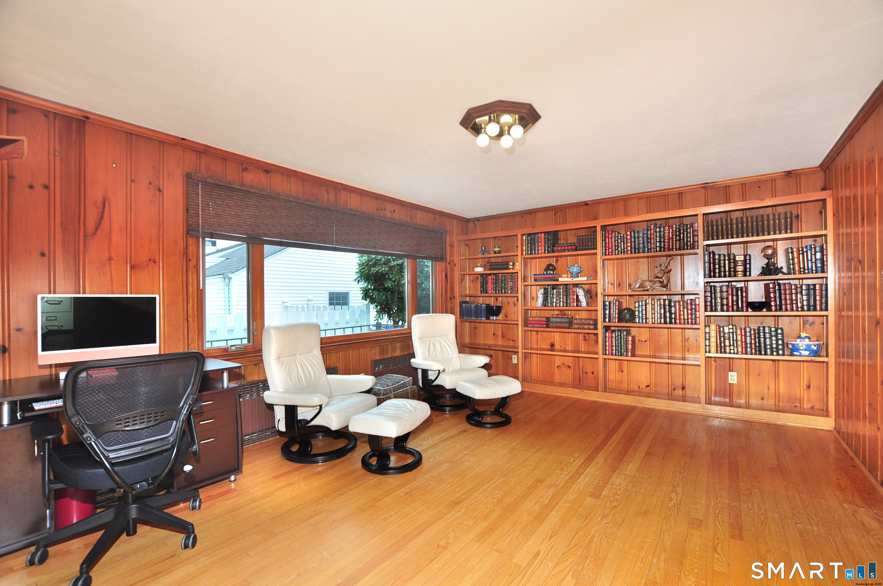 44 Miamis Road West Hartford, CT 06117 - Photo 18 of 39 a living room with furniture and a flat screen tv