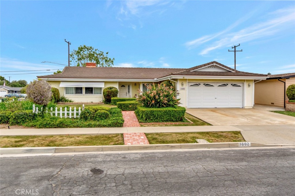 front view of house with a yard