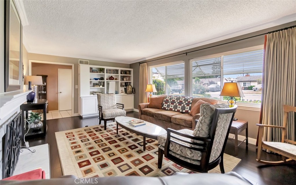 1602 Minorca Drive Costa Mesa, CA 92626 - Photo 5 of 33 a living room with furniture and a window