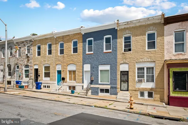 a front view of a building with street