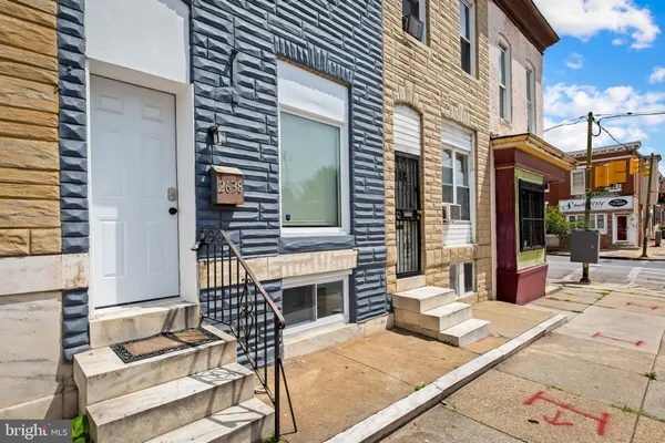 a view of a building with sitting area