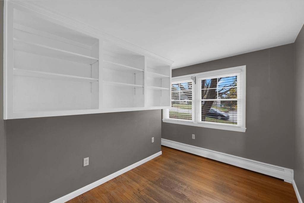 16 Hadley Path West Brookfield, MA 01585 - Photo 13 of 30 an empty room with wooden floor and windows