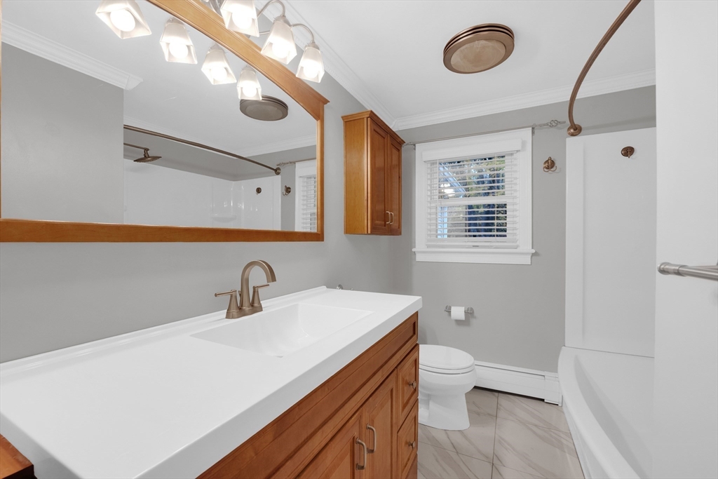 16 Hadley Path West Brookfield, MA 01585 - Photo 14 of 30 a bathroom with a sink a toilet and a mirror