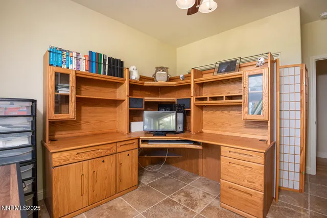 a bathroom with double vanity and a mirror