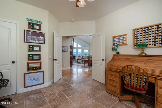 a view of storage and utility room with washer and dryer