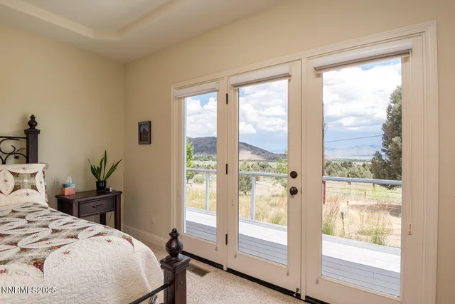 a bathroom with a tub a sink and mirror