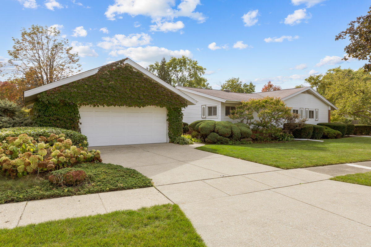 851 Crest Avenue Elk Grove Village, IL 60007 - Photo 19 of 25 a front view of a house with garden